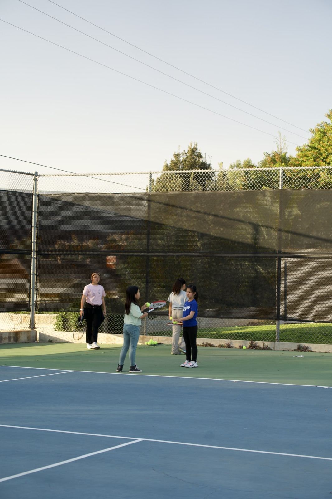 Players warming up at golden hour