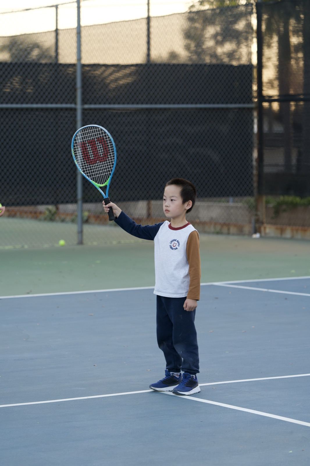 Young player swinging
